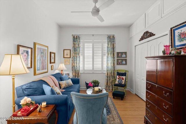 1316 Asher Ct, Ormond Beach, FL 32174 - living area with ceiling fan, light wood-style floors, and baseboards