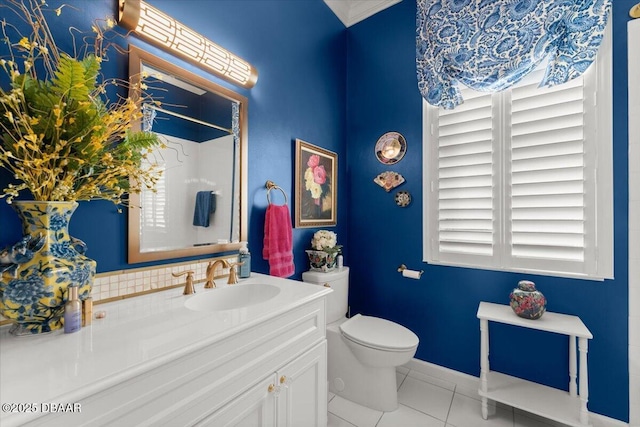 1316 Asher Ct, Ormond Beach, FL 32174 - full bathroom with toilet, tile patterned flooring, vanity, and healthy amount of natural light