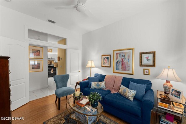 1316 Asher Ct, Ormond Beach, FL 32174 - living area featuring a ceiling fan and wood finished floors