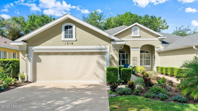 1316 Asher Ct, Ormond Beach, FL 32174 - view of front facade with an attached garage, driveway, and stucco siding