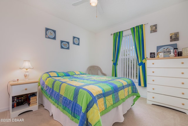 bedroom with carpet floors and ceiling fan