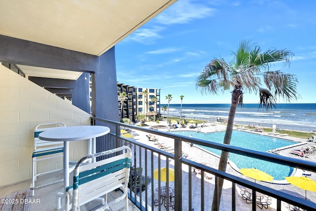 balcony featuring a water view