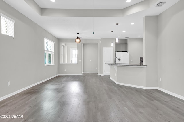 304 Coral Reef Way, Daytona Beach, FL 32124 - unfurnished living room featuring recessed lighting, baseboards, visible vents, and dark wood-type flooring