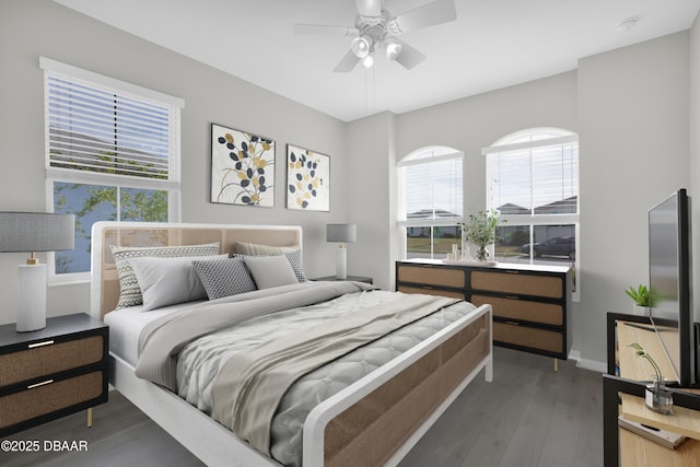 304 Coral Reef Way, Daytona Beach, FL 32124 - bedroom featuring ceiling fan, baseboards, multiple windows, and wood finished floors