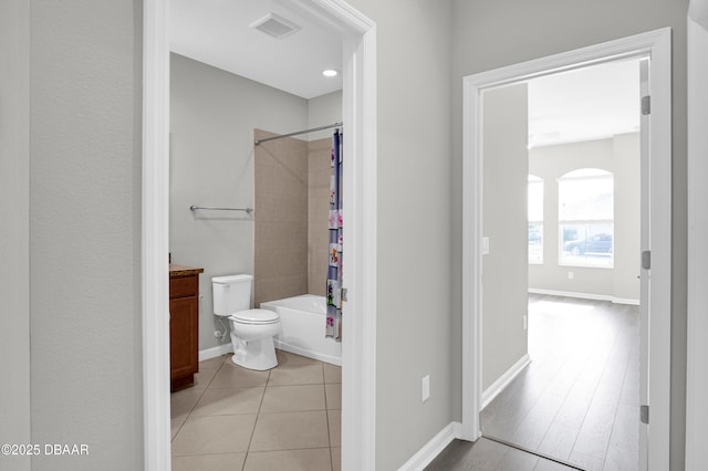 304 Coral Reef Way, Daytona Beach, FL 32124 - full bathroom with tile patterned flooring, vanity, shower / tub combo with curtain, toilet, and visible vents