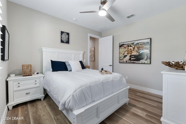 bedroom featuring light hardwood / wood-style floors and ceiling fan