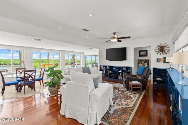 101 Azalea Cir, New Smyrna Beach, FL 32168 - living area featuring wood finished floors, a ceiling fan, and recessed lighting