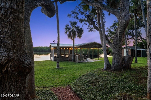 101 Azalea Cir, New Smyrna Beach, FL 32168 - view of grassy yard featuring a water view