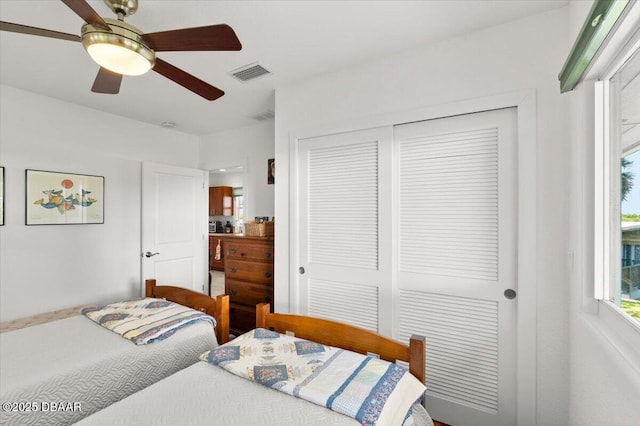 101 Azalea Cir, New Smyrna Beach, FL 32168 - bedroom featuring a closet and ceiling fan