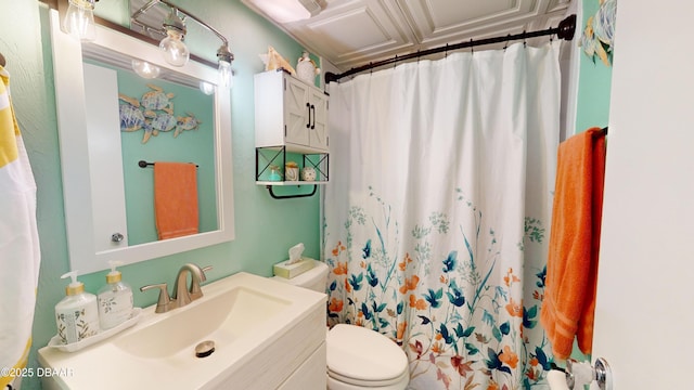 bathroom featuring toilet, a shower with curtain, and vanity