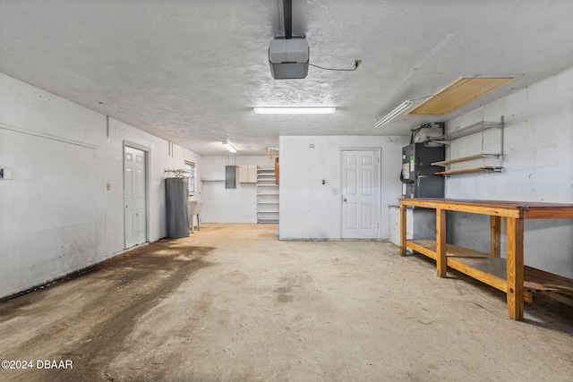 garage with a workshop area, electric water heater, electric panel, a garage door opener, and heating unit