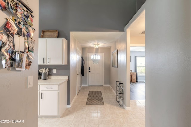 interior space with light tile patterned floors