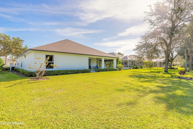 exterior space with a yard