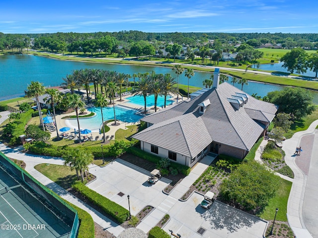 673 Elk River Dr, Ormond Beach, FL 32174 - bird's eye view of a large body of water, a pool, and a tree filled landscape