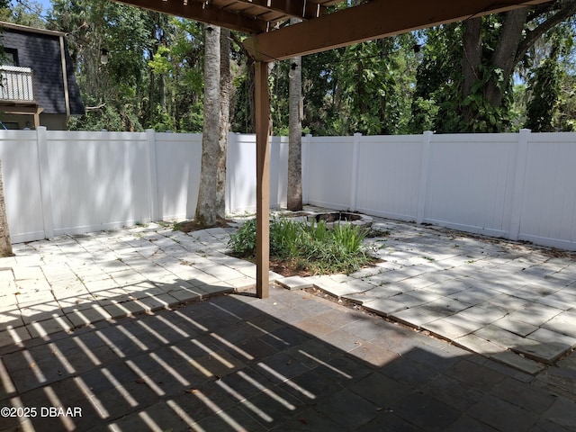 view of patio with a fenced backyard