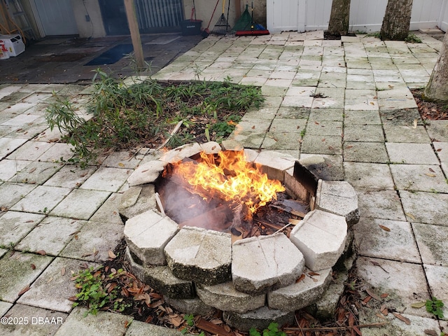 exterior details with a fire pit