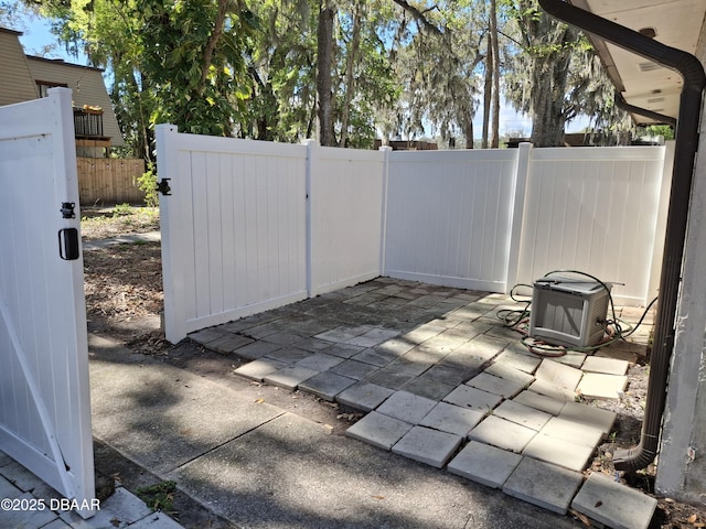 view of patio / terrace featuring fence