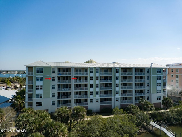 view of building exterior featuring a water view