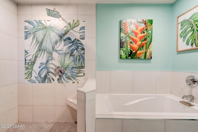 bathroom with a tile shower and a garden tub