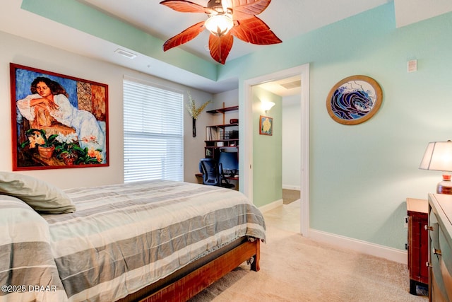 bedroom with light carpet, baseboards, visible vents, and ceiling fan