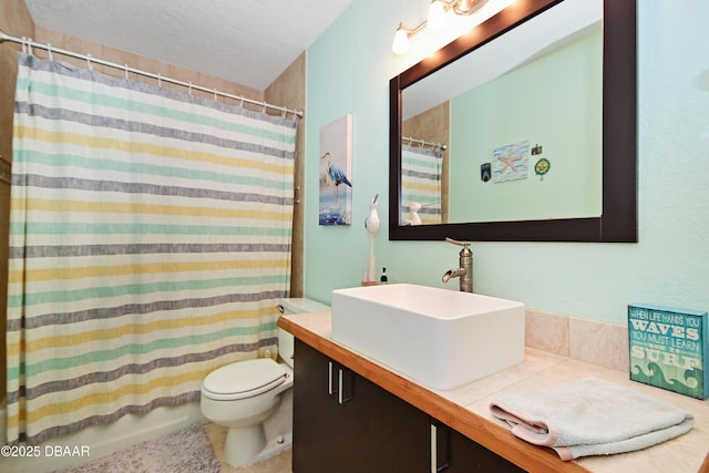 bathroom with vanity, a textured ceiling, toilet, and a shower with shower curtain