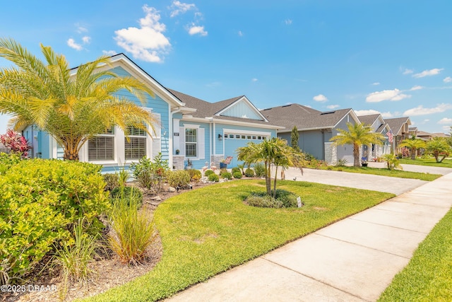 557 Mosaic Blvd, Daytona Beach, FL 32124 - ranch-style home with driveway, a front lawn, and a garage