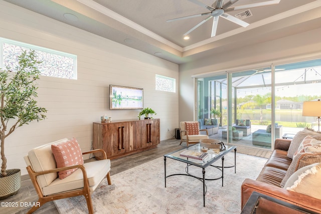 557 Mosaic Blvd, Daytona Beach, FL 32124 - living room featuring ceiling fan, ornamental molding, a sunroom, light wood finished floors, and recessed lighting