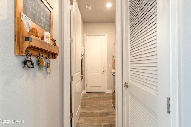 557 Mosaic Blvd, Daytona Beach, FL 32124 - hallway featuring wood finished floors and recessed lighting