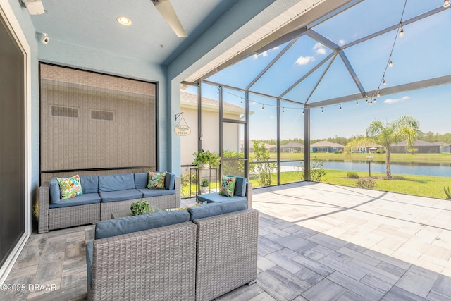557 Mosaic Blvd, Daytona Beach, FL 32124 - view of patio / terrace with a water view, an outdoor hangout area, ceiling fan, and glass enclosure