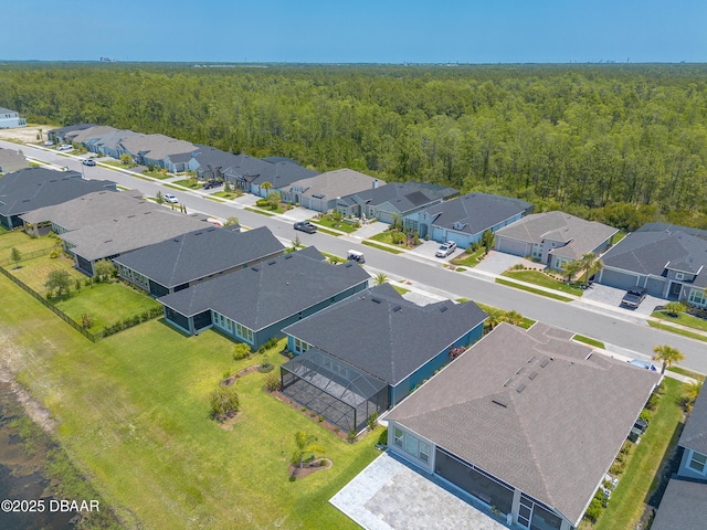 557 Mosaic Blvd, Daytona Beach, FL 32124 - aerial view of residential area featuring a heavily wooded area