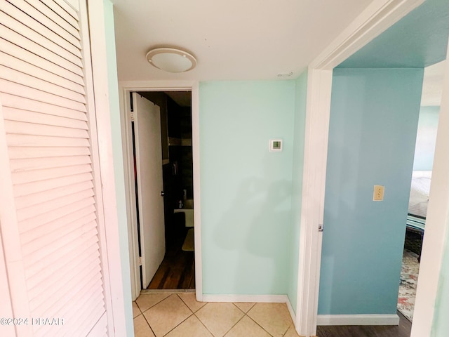 2801 N Halifax Ave Unit 250, Daytona Beach, FL 32118 - corridor with baseboards and tile patterned floors