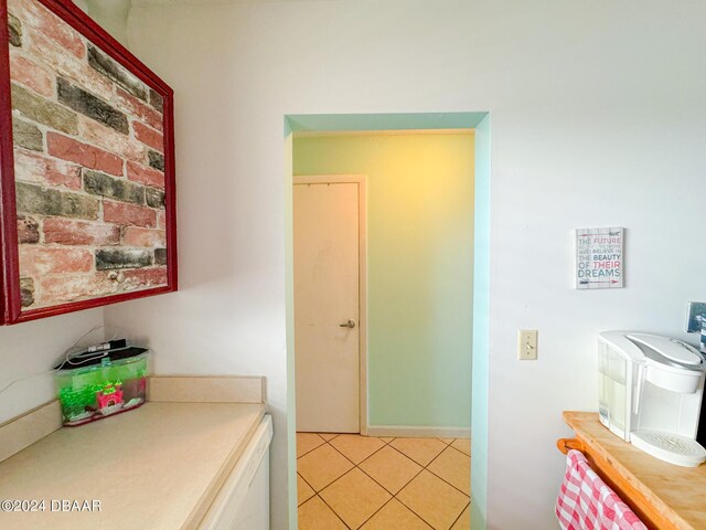2801 N Halifax Ave Unit 250, Daytona Beach, FL 32118 - hallway with light tile patterned floors