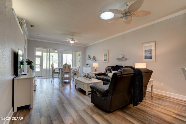 1455 Carlow Cir, Ormond Beach, FL 32174 - living area with a ceiling fan, wood finished floors, crown molding, and baseboards