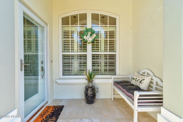 1455 Carlow Cir, Ormond Beach, FL 32174 - entrance to property featuring stucco siding