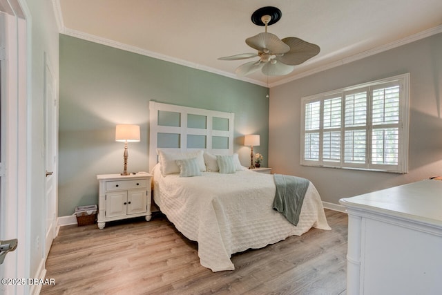 1455 Carlow Cir, Ormond Beach, FL 32174 - bedroom with light wood-style flooring, baseboards, crown molding, and ceiling fan