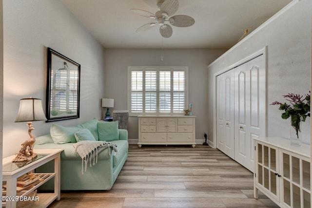 1455 Carlow Cir, Ormond Beach, FL 32174 - sitting room featuring a ceiling fan and light wood-style floors