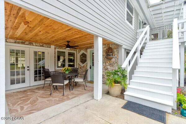 view of patio with ceiling fan and french doors