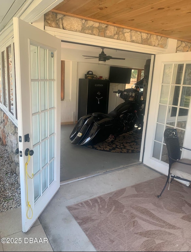 property entrance featuring french doors