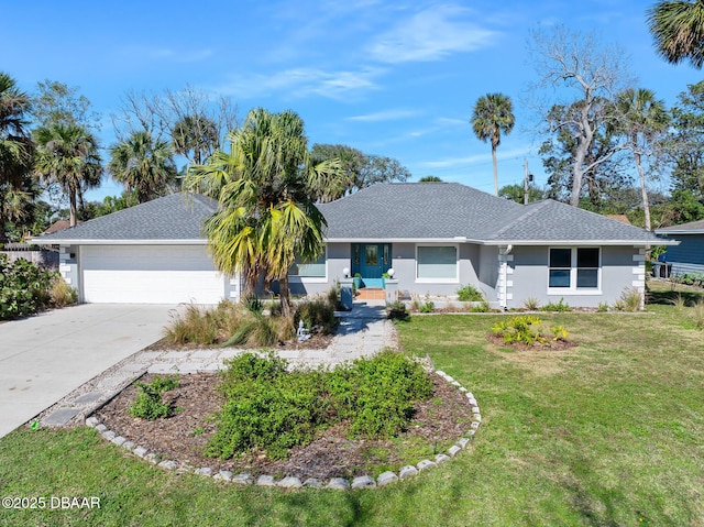 ranch-style home featuring a garage and a front lawn