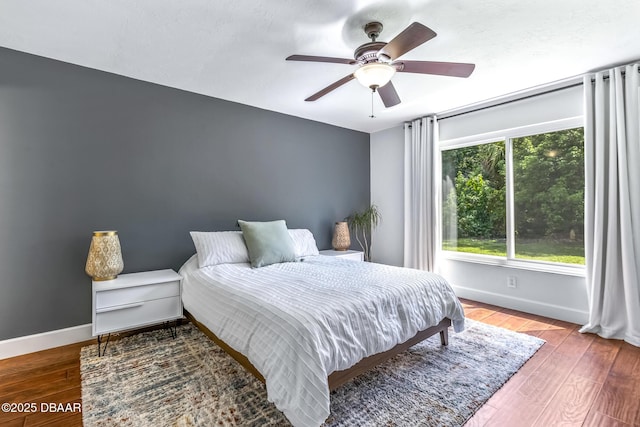 887 Sugar House Ct, Port Orange, FL 32129 - bedroom with wood finished floors and a ceiling fan