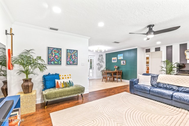 887 Sugar House Ct, Port Orange, FL 32129 - living room featuring crown molding, ceiling fan, wood finished floors, a textured ceiling, and recessed lighting