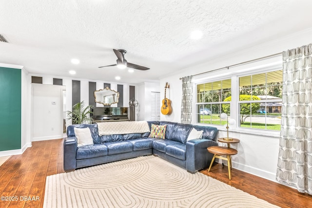 887 Sugar House Ct, Port Orange, FL 32129 - living area with a textured ceiling, ceiling fan, wood-type flooring, ornamental molding, and recessed lighting