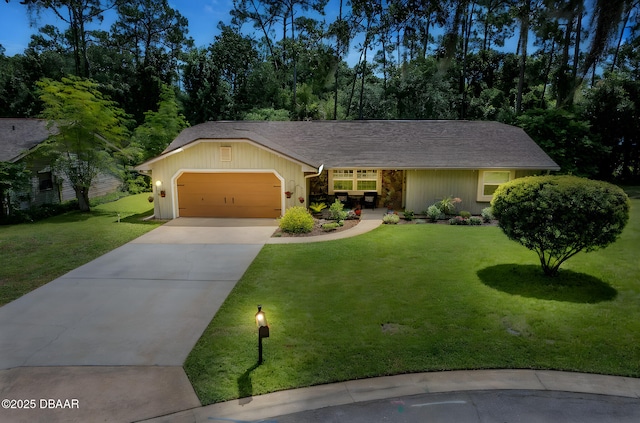 887 Sugar House Ct, Port Orange, FL 32129 - view of front of property with driveway, an attached garage, and a front yard