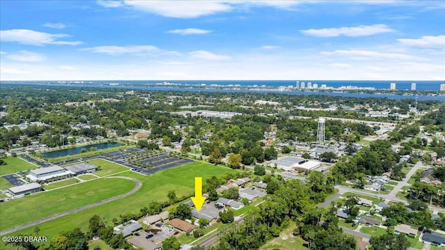 birds eye view of property featuring a water view