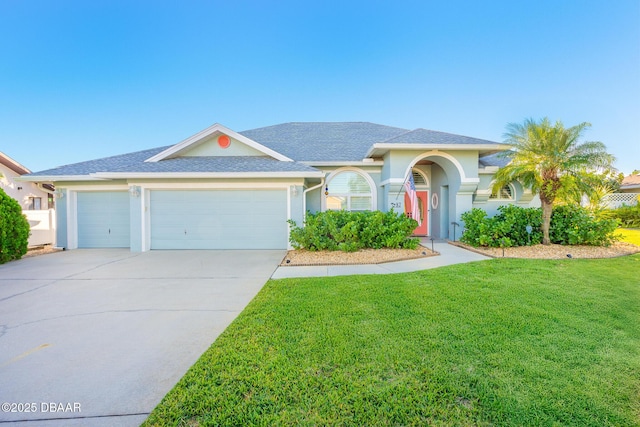 ranch-style home featuring a front yard, a shingled roof, stucco siding, concrete driveway, and an attached garage