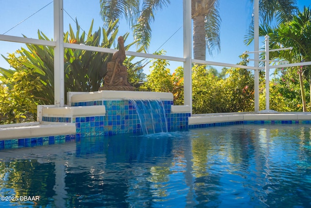 pool featuring glass enclosure