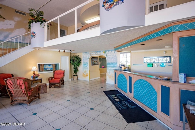 935 S Atlantic Ave Unit 211, Daytona Beach, FL 32118 - reception area with stairs and arched walkways