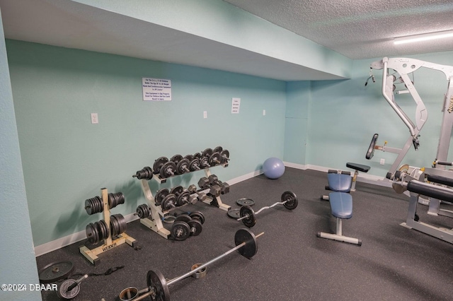 935 S Atlantic Ave Unit 211, Daytona Beach, FL 32118 - exercise room with a textured ceiling