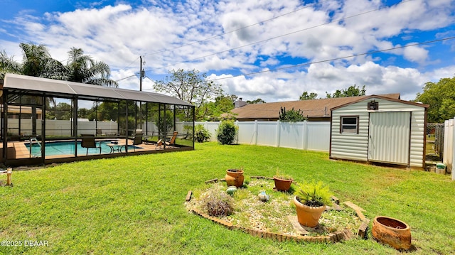 2504 Sabal Palm Dr, Edgewater, FL 32141 - view of yard featuring a storage shed, an outdoor structure, a fenced backyard, and a fenced in pool
