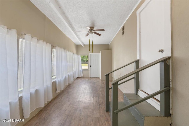 2300 Calloway Dr, Orlando, FL 32810 - corridor featuring a textured ceiling and wood finished floors